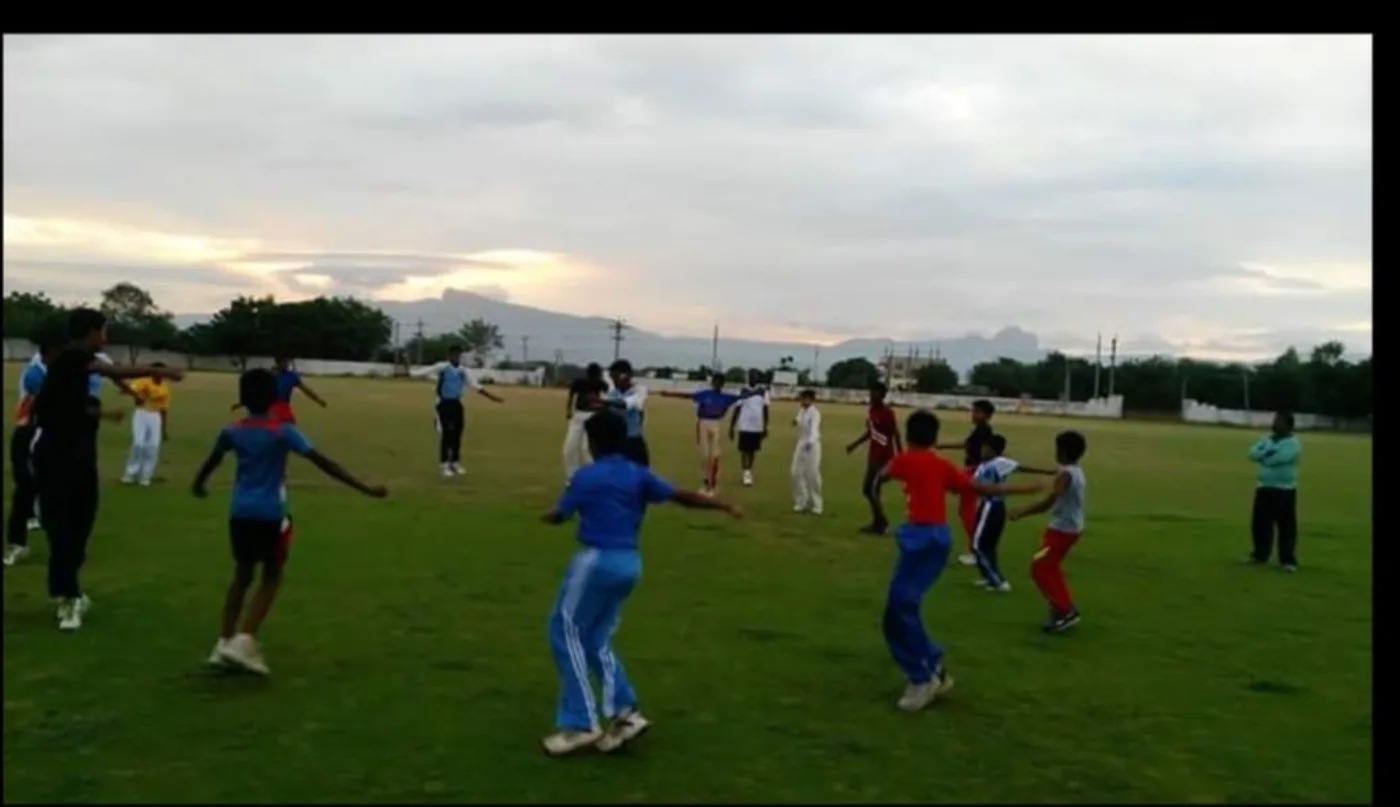 Students training on the cricket field