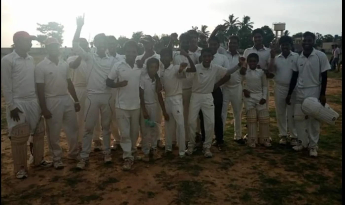 Cricket team standing outdoors